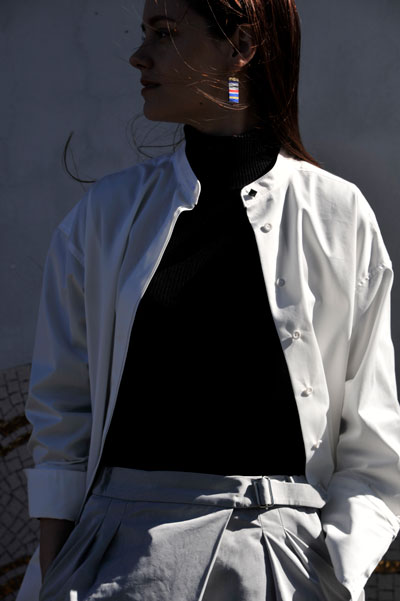 A woman wearing a FUTAGO cotton shirt